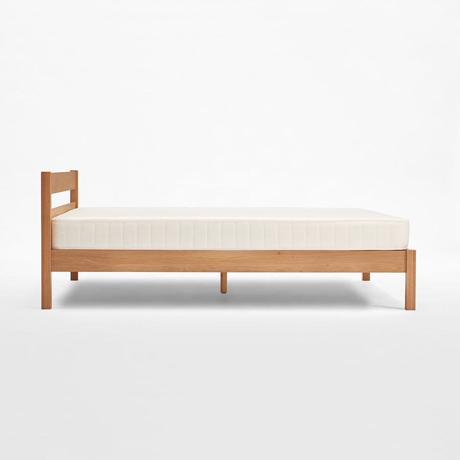 D) Wooden bed Q