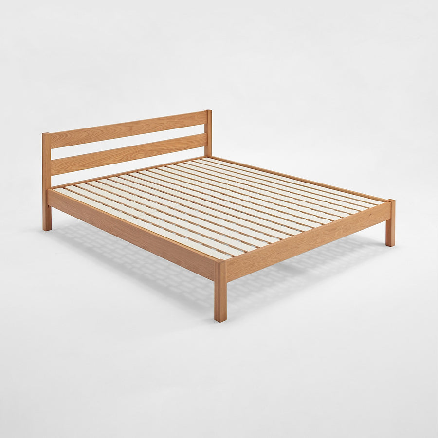 D) Wooden bed Q