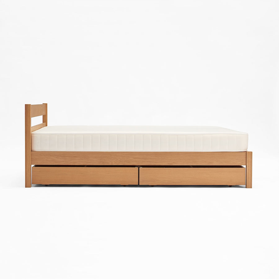 D) Wooden bed Q
