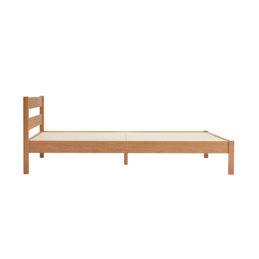 D) Wooden bed Q